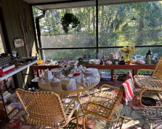 Porch with dishes, pots, tools, etc.