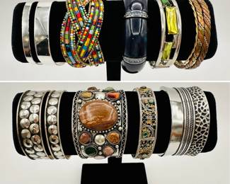 So many styles of bracelets - filigree metal, cuffs, beaded, and more...