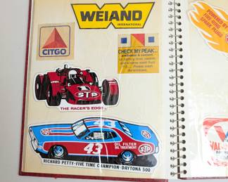 Collection of vintage stickers, mainly automotive and beer brands