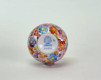 Base of the Herend Hungarian porcelain openwork ball jar with floral bud atop the lid