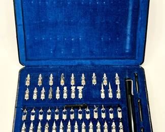 Open view of vintage Pelikan Graphos Pen Set in original case, with dozens of calligraphic pen nibs