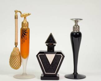 Art Deco perfume bottles, DeVilbiss 1928 Orange and Black Perfume Atomizer, a black and white perfume flask, and a black Steuben glass DeVilbiss perfume dauber bottle