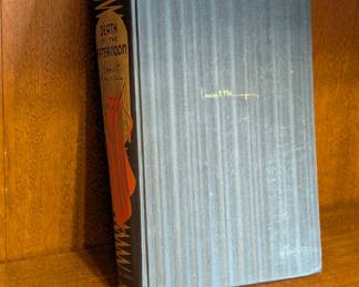 A 1932 hardcover copy of Death in the Afternoon by Ernest Hemingway