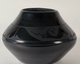 A beautiful piece of Santa Clara pueblo blackware pottery, Navajo art, signed on base Adakai Navajo