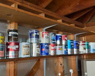 Cans of paint, primer, sealer, stain