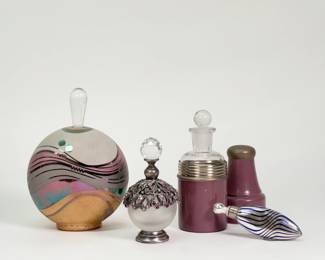 Another view of vintage art glass stoppered perfume bottles