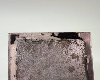 Underside view of the vintage Art Deco silver plate female figure nude jewelry/trinket box