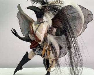 A contemporary doll collectible by Mocking-Bird Creations, artist Betty Nelson-Daniel