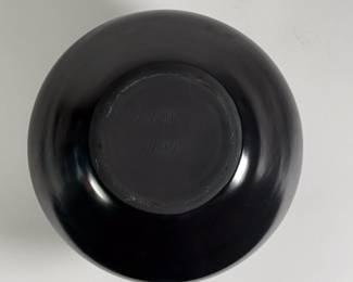 Base of beautiful piece of Santa Clara pueblo blackware pottery, Navajo art, signed on base Adakai Navajo
