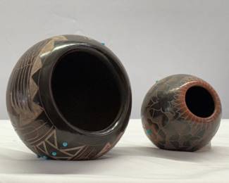 Another view of Native American pottery: A Sioux, Norman Red Star Blackware Pottery Bowl, and a Santa Clara Pottery piece by Julie Gutierrez