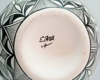 Signature on base of traditional Native American Pueblo Acoma pottery, signed by artist E. Tafoya, Jemez Pueblo