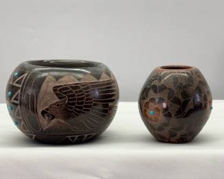 Native American pottery: A Sioux, Norman Red Star Blackware Pottery Bowl, and a Santa Clara Pottery piece by Julie Gutierrez