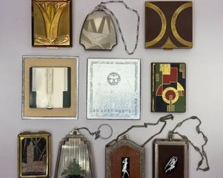 Art Deco compacts from amazing collection including a Richard Hudnut "Du Barry" tulip design lipstick holder compact, a shield shape engraved Art Deco compact with wrist chain; a vintage Girey 1934 Chicago World’s Fair Hall Of Science Art Deco makeup compact, more Richard Hudnet Art Deco era compacts