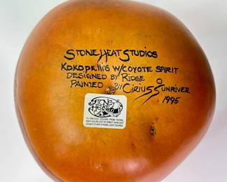 Underside signatures on the  Kokopellis w/Coyote Spirit vase designed by Ridge and painted by Cirius Sunriver, 1995