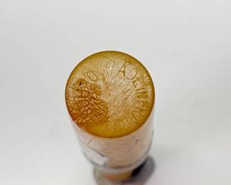 Closeup of Art Deco era manicure set containers and covered perfume container, made in France and Germany