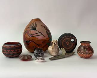 Native American southwest pottery pieces including a by artists including a Kokopellis w/Coyote Spirit vase designed by Ridge and painted by Cirius Sunriver, 1995, plus pieces by artists including Myron Charlie, Hilda Whitegoat, M. C. Antonio and more