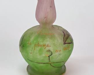 Closeup of a Gallé art glass vase, acid etched and gilded, signed on base