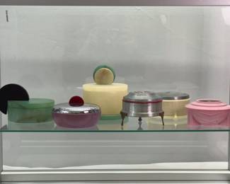 Collectible Art Deco era boxes and jars