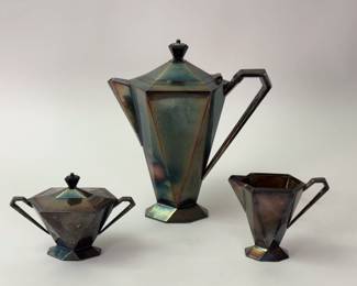 Dynamic Art Deco design in this vintage Wilcox Silver Plate Co. tea or coffee set with sugar, creamer, and tea/coffee pot.