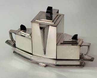 "Diament" Tea Set, circa 1928, designed by Jean G. Theobald. Made of silver plate and Bakelite by Wilcox Silver Plate Co. in America. With its stunning Art Deco lines, examples of this tea set can be seen in the Los Angeles County Museum of Art and the Museum of Fine Art Houston.