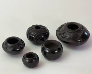 Native American Navajo pottery, Santa Clara blackware pottery, signed by various artists – Santa Clara Pottery and its Pueblo are famous for producing hand-crafted pottery, specifically blackware and redware with deep engravings.