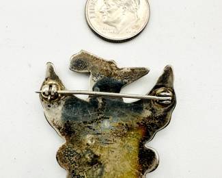 Reverse view of vintage Native American southwest Zuni Pueblo Thunderbird design turquoise and carnelian inlaid silver pin