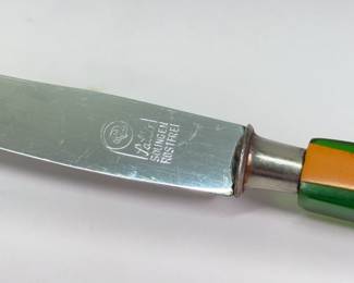 Closeup of vintage Solingen Salta Art Deco Fruit Knives with Stand