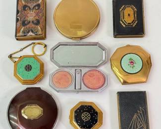 Art Deco collectibles - a vintage Mondaine leather book Cig-Vanette all in one powder, rouge and cigarette compact, a Richard Hudnut Gold Toned Mirror Compact Sun Ray Design, a  Richard Hudnut Le Debut Cloisonné Powder, Rouge and Mirror Compact, two vintage Art Deco Modaine New York Leather Bound Compacts w/ Powder Rouge
