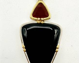 A Chinese sterling silver pendant