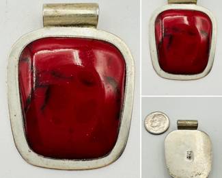 A sterling silver and stone pendant, hand crafted in Mexico