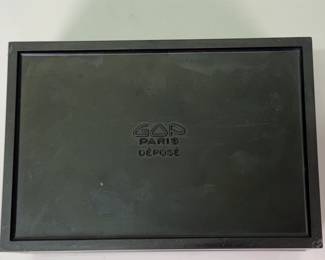 Closeups of Art Deco era lidded trinket and cigarette boxes and containers - Hickok, Acorn, GOP Paris Déposé