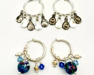 Silver tone hoop earrings with beaded dangles