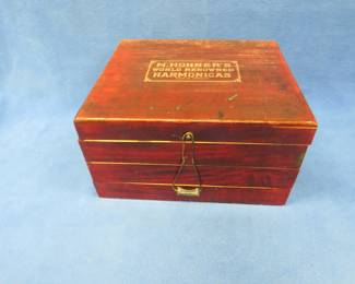 Lot 200. Hohner's World Renown Harmonica Merchant Display Case. Interior picture is intact. Three-tiered shelving. Very good condition.