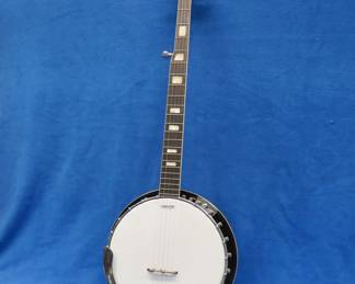 Lot 388. Lumitone 5-string banjo in excellent condition with a hard case
