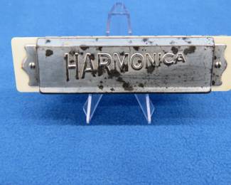 Lot 275. Harmonica for the kids to practice on{!}