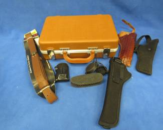 Lot 241. Gun Guard case, holsters, new sling, and more