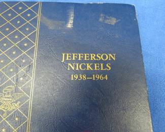 Lot 412. Complete Whitman Jefferson nickel album from 1938 through 1964 including all 11 35% silver war nickels. 207 total nickels