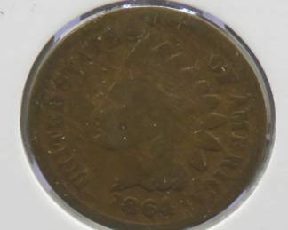 Lot 372. 1864 with L Indian Head penny. This is how the coin was identified by the seller. The L is very hard to see, but we think it is there.