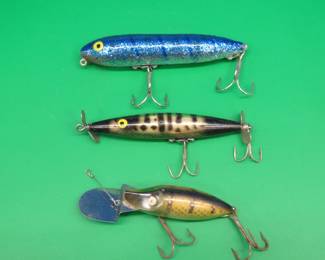 Lot 123. Heddon Dying Flutter, Heddon Go Deeper River Runt, and a Heddon Zaru Spook