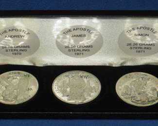 Lot 400. Three coin sterling silver religious themed medallion set. Total weight 79.22 grams.