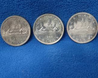 Lot 43. Three 1965 Canadian 80% silver dollars