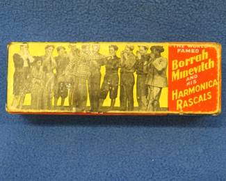 Lot 22. Borrah Minevitch 4" Technique Tone Harmonica. Needs tuning. Box is in very good condition.