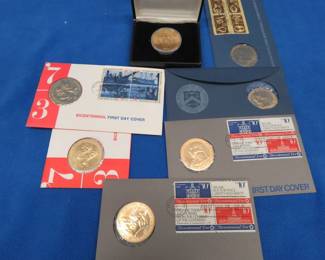 Lot 404. Bicentennial medallions and stamps.