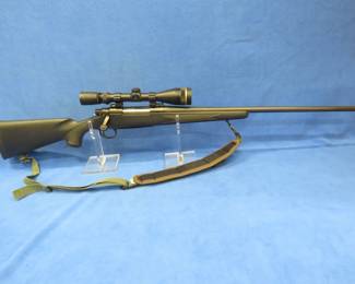 Lot 11. Remington 700 ADL Deluxe 7mm Rem Mag. bolt-action rifle. 24" barrel, sling, and a Leupold Varx III 4.5-14 x 40mm scope