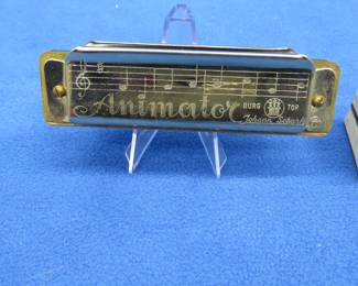 Lot 271. Vintage Johann Schunk Animator Castle Brand Harmonica in the key of C with a box in very good condition. Sounds great.