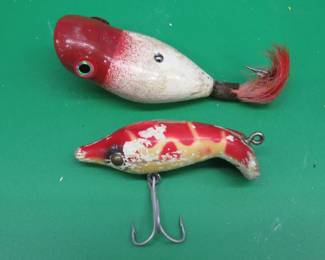 Lot 267. Vintage 2 1/2" weedless Widow? and an unidentified (Paw Paw)? wooden 2 5/8" bait with tack eyes.