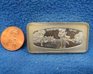 Lot 185. 1970 Franklin Mint sterling silver Christmas ingot. 65.90 grams.