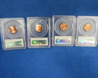 Lot 441. Four 2009 Lincoln Bicentennial pennies graded by PCGS as MS65RD