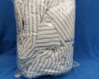 Lot 304. King-size comforter with shams. Never used