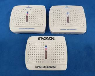 Lot 249. Three like new rechargeable mini-dehumidifiers. Great for gun safes.